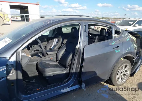 2023 Tesla Model Y Rwd from USA, damaged, VIN 7SAYGDED2PF960954
